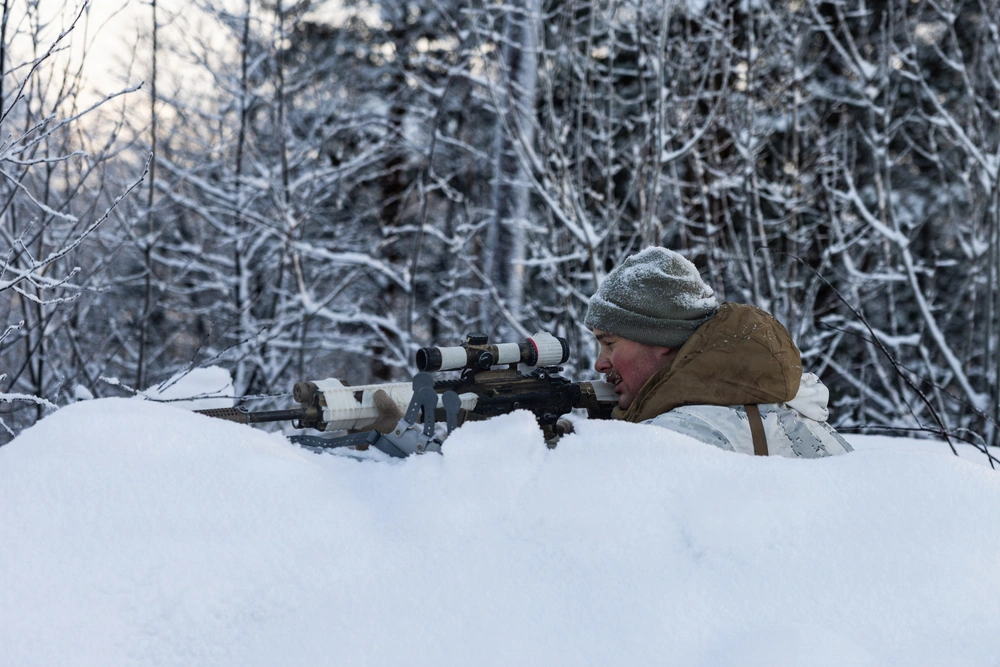 Sniper in winter position